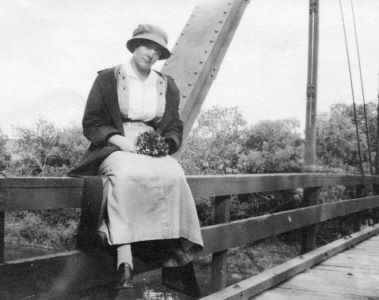 People posing with bridges