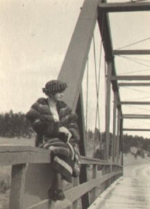 People posing with bridges