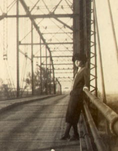 People posing with bridges