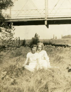 People posing with bridges