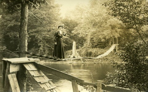 People posing with bridges