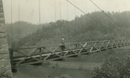 People posing with bridges