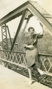 People posing with bridges